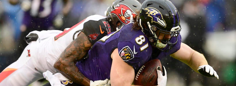 <p>Dec 16, 2018; Baltimore, MD, USA; Tampa Bay Buccaneers cornerback Ryan Smith (29) tackles Baltimore Ravens tight end Hayden Hurst (81) during the first quarter at M&T Bank Stadium.</p>