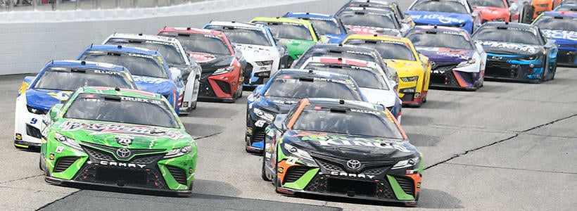 <p>Jul 17, 2022; Loudon, New Hampshire, USA; NASCAR Cup Series driver Martin Truex Jr. (19) (left) and driver Bubba Wallace (23) (right) (race0 during the Ambetter 301 at New Hampshire Motor Speedway.</p>