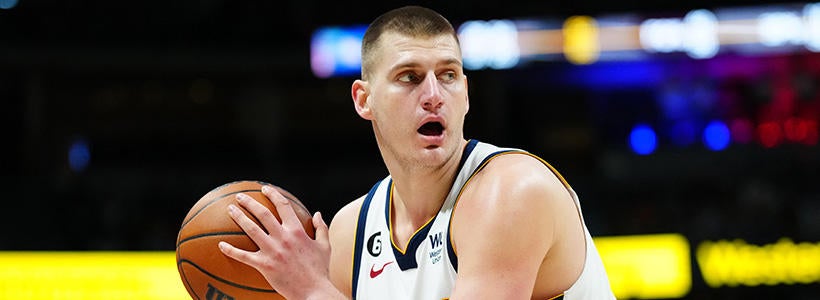 <p>Jan 1, 2023; Denver, Colorado, USA; Denver Nuggets center Nikola Jokic (15) controls the ball in the second quarter against the Boston Celtics at Ball Arena.</p>