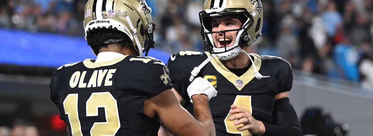 <p>Derek Carr and Chris Olave, New Orleans Saints</p>