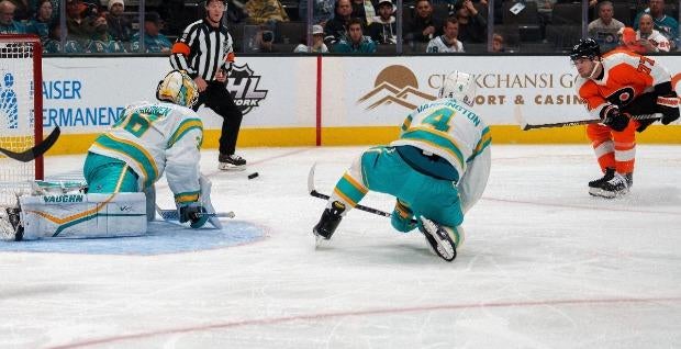 <p>flyers sharks</p>