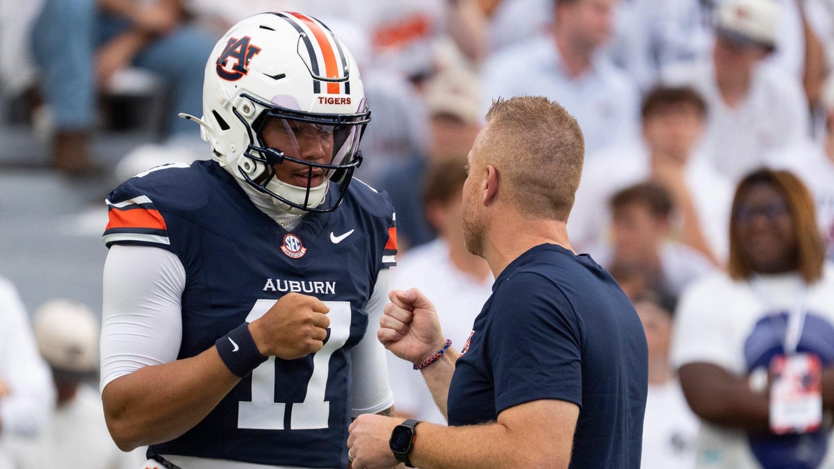 <p>Alex Golesh and Byrum Brown, Auburn Tigers</p>